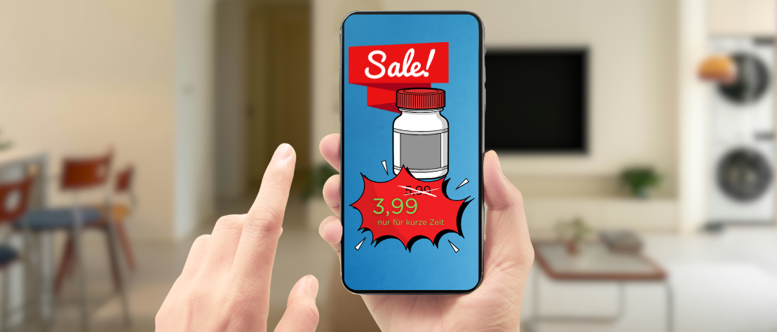 Auf einem Smartphone-Bildschirm ist eine Tablettenpackung abgebildet, darüber ein Banner „Sale“, darunter ein Sonderangebotspreis: 5,99 sind durchgestrichen, 3,99 hervorgehoben mit dem Zusatz „nur für kurze Zeit“.