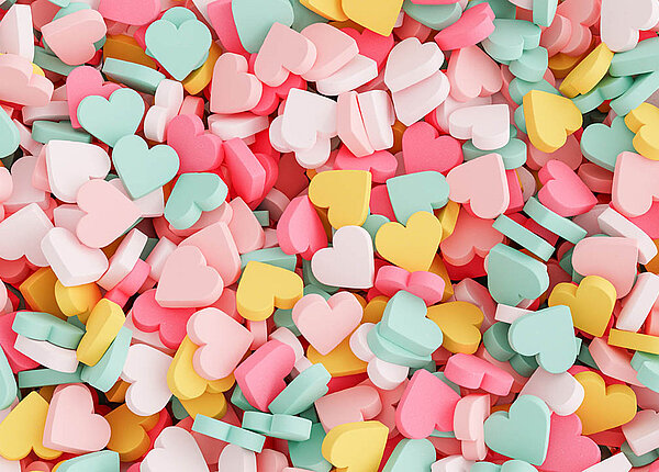 Zuckerfreie Ernährung von Kleinkindern für die Herzgesundheit Viele bunte Zuckerherzen