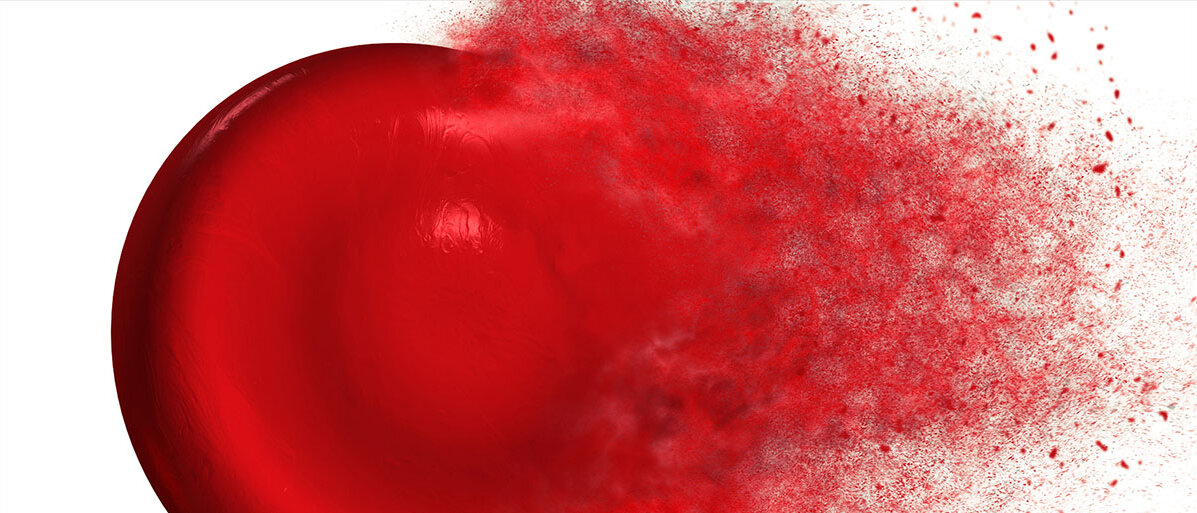 Ein rotes Blutkörperchen löst sich in Staub auf.