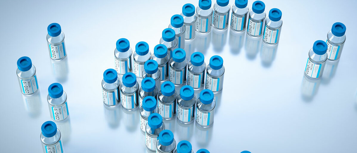 Mehrere Impfstoff-Vials bilden ein Euro-Zeichen