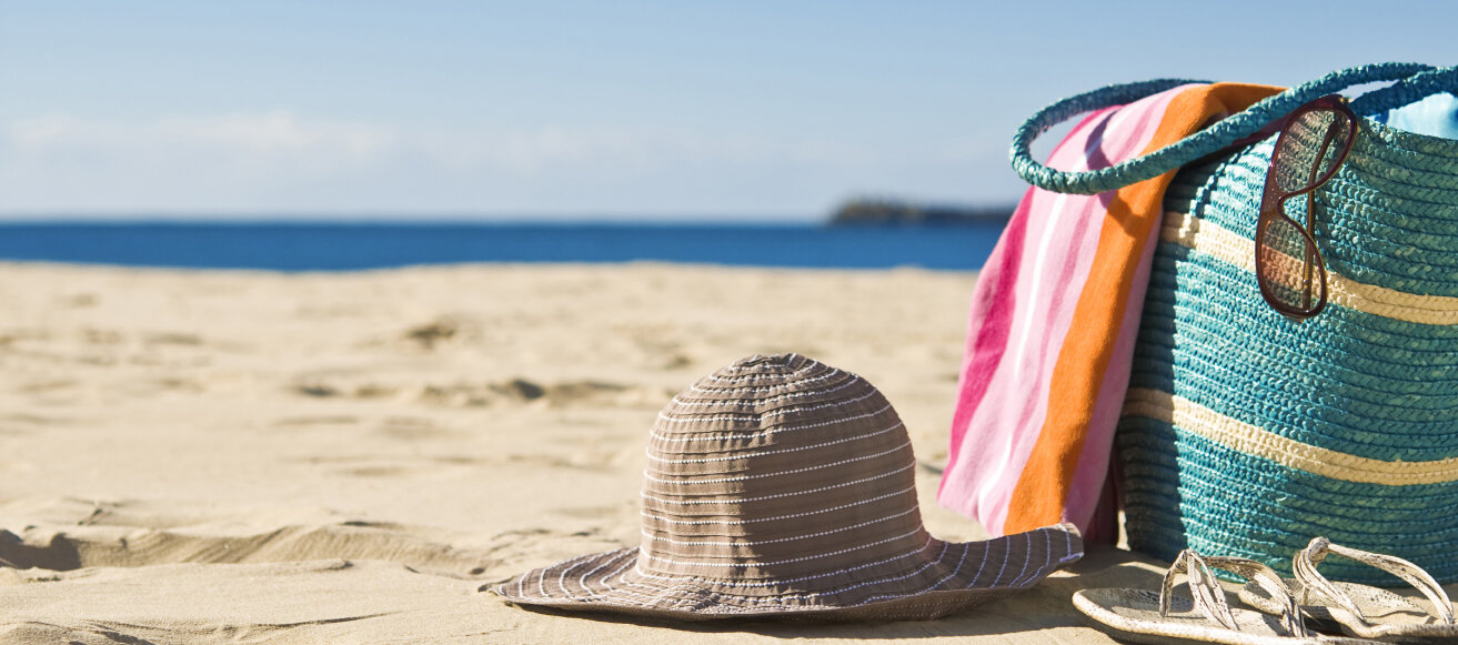 Strandtasche im Sand © -axle- / IStock / Thinkstock